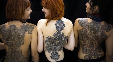 Tatuaggi in una foto d'archivio © ANSA