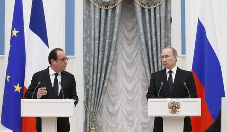 Vladimir Putin e Francois Hollande © EPA
